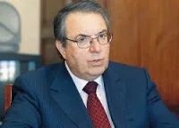 Γεώργιος Μπαμπινιώτης, Σαν να ακούω τη φωνή του Νικόλα Άσιμου: «Ρε μπαγάσηδες, τι δουλειά έχουν τα τραγούδια μου με τα Θρησκευτικά σας;»