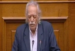 Μ. Γλέζος: “Σας εγκαλώ τώρα .. Συμφωνείτε ή δεν συμφωνείτε ότι τα ιερά και τα όσια είναι το χρήμα;”